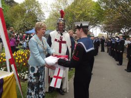 Mayor Cllr Susan Bayford receiving the flag of St.George